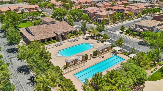 1922 Via Delle Arti, Henderson, NV 89044 - aerial perspective of suburban area with a pool area