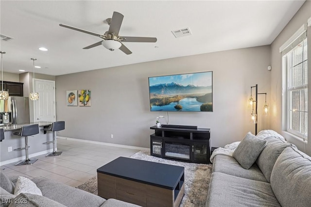 1922 Via Delle Arti, Henderson, NV 89044 - living area with recessed lighting, ceiling fan, and light tile patterned flooring