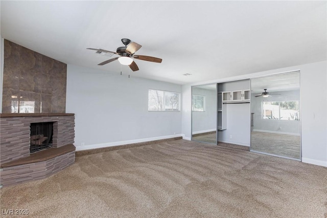 1700 Ivanhoe Way, Las Vegas, NV 89102 - unfurnished living room with a ceiling fan, carpet, and a fireplace