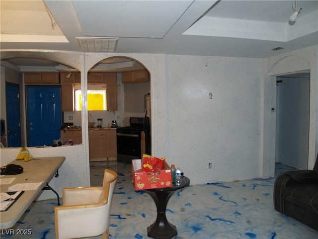 5068 Killarney St, Las Vegas, NV 89122 - living room featuring arched walkways