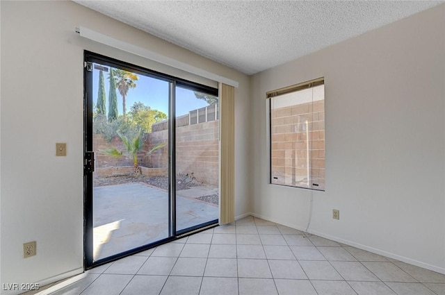 8809 Beach Front Dr, Las Vegas, NV 89117 - unfurnished room featuring a textured ceiling and baseboards
