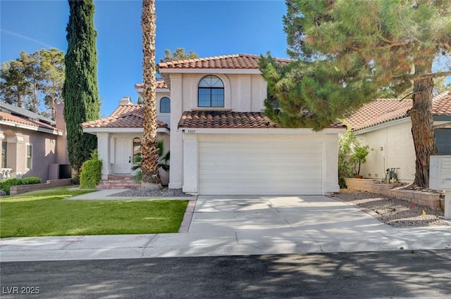 8809 Beach Front Dr, Las Vegas, NV 89117 - mediterranean / spanish-style home with a tile roof, stucco siding, driveway, a front lawn, and a garage