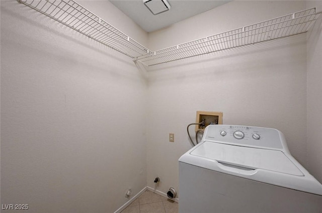8809 Beach Front Dr, Las Vegas, NV 89117 - washroom with washer / clothes dryer and light tile patterned floors