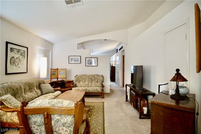 6131 Pumpkin Patch Ave, Las Vegas, NV 89142 - living room featuring light colored carpet and arched walkways