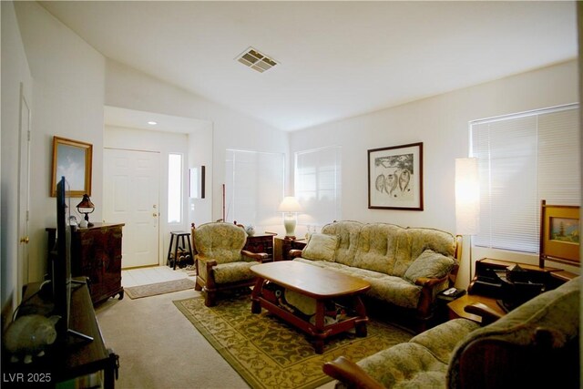 6131 Pumpkin Patch Ave, Las Vegas, NV 89142 - living area with carpet flooring and vaulted ceiling