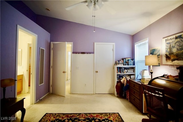 6131 Pumpkin Patch Ave, Las Vegas, NV 89142 - bedroom with lofted ceiling, light colored carpet, a desk, connected bathroom, and a ceiling fan