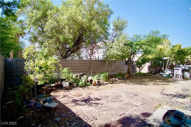 6131 Pumpkin Patch Ave, Las Vegas, NV 89142 - fenced backyard featuring a patio