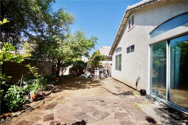 6131 Pumpkin Patch Ave, Las Vegas, NV 89142 - fenced backyard featuring a patio
