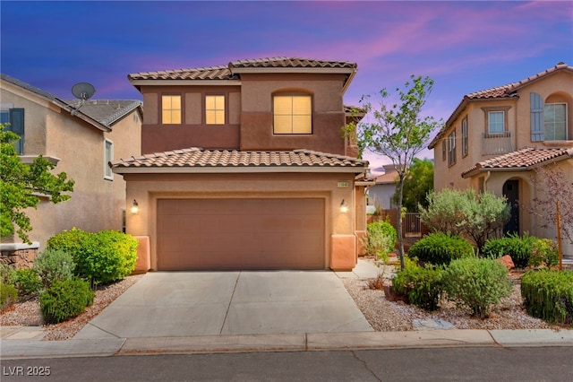 11649 Royal Derwent Dr, Las Vegas, NV 89138 - mediterranean / spanish-style home featuring driveway, a tile roof, a garage, and stucco siding