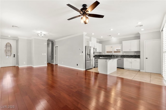 11649 Royal Derwent Dr, Las Vegas, NV 89138 - unfurnished living room with ceiling fan, light wood-style floors, recessed lighting, and crown molding