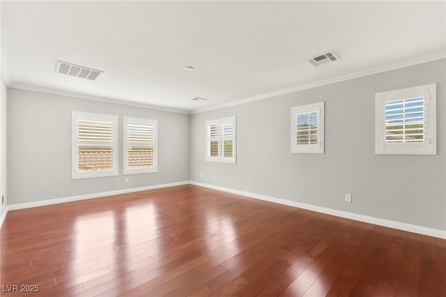 11649 Royal Derwent Dr, Las Vegas, NV 89138 - empty room with dark wood-style floors, crown molding, and healthy amount of natural light