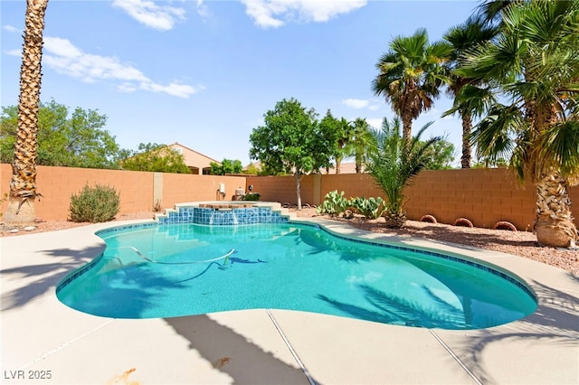 11649 Royal Derwent Dr, Las Vegas, NV 89138 - view of swimming pool featuring a fenced backyard, a patio area, and a pool with connected hot tub