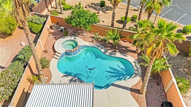 11649 Royal Derwent Dr, Las Vegas, NV 89138 - view of pool with a fenced backyard and a pool with connected hot tub
