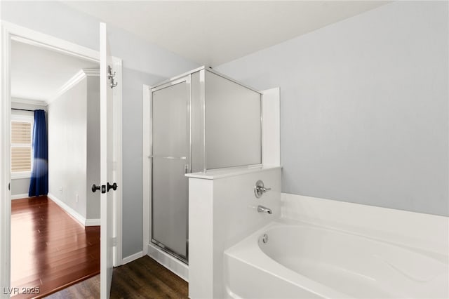 11649 Royal Derwent Dr, Las Vegas, NV 89138 - full bathroom featuring a shower stall, a bath, and wood finished floors
