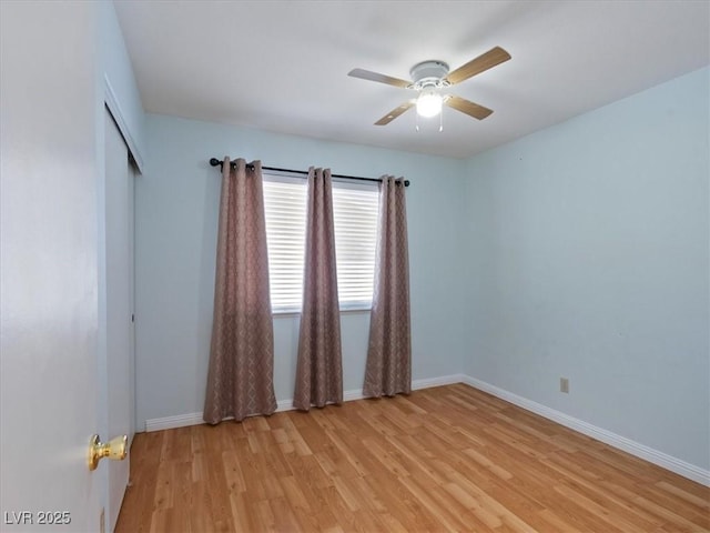 4323 Pageantry Falls Dr, North Las Vegas, NV 89031 - empty room featuring light wood-style floors and ceiling fan