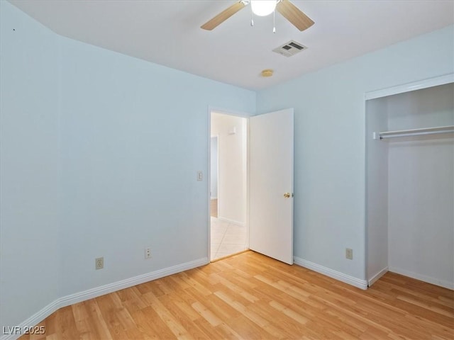 4323 Pageantry Falls Dr, North Las Vegas, NV 89031 - unfurnished bedroom featuring light wood finished floors, a closet, and ceiling fan
