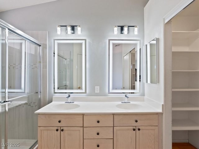 4323 Pageantry Falls Dr, North Las Vegas, NV 89031 - full bath with a stall shower, double vanity, and a closet