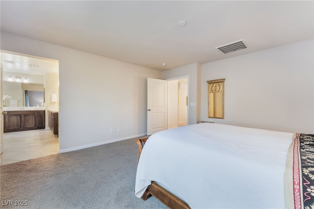 151 Duckhook Ave, Las Vegas, NV 89148 - bedroom featuring light colored carpet and connected bathroom