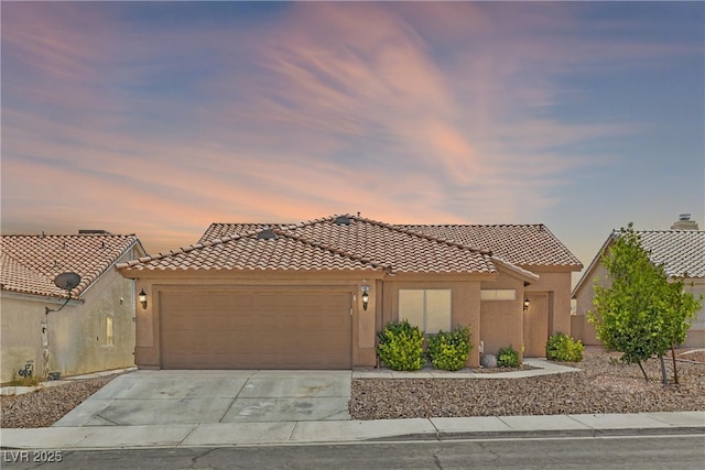 7825 White Grass Ave, Las Vegas, NV 89131 - view of front of home featuring concrete driveway, a tiled roof, a garage, and stucco siding