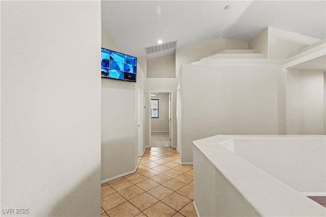 7825 White Grass Ave, Las Vegas, NV 89131 - hall featuring light tile patterned flooring