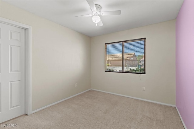 7825 White Grass Ave, Las Vegas, NV 89131 - spare room featuring light colored carpet and a ceiling fan