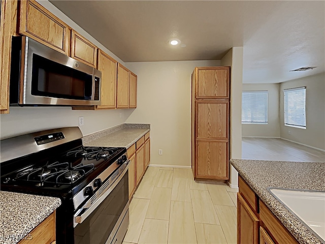2132 Tierra Del Verde St, Las Vegas, NV 89156 - kitchen featuring appliances with stainless steel finishes and recessed lighting