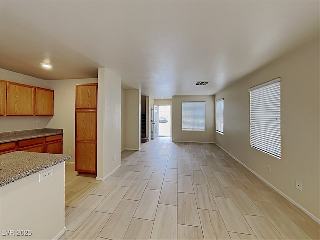 2132 Tierra Del Verde St, Las Vegas, NV 89156 - kitchen with light wood-type flooring and open floor plan