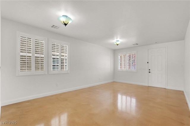 4036 W Bird Man Ln, North Las Vegas, NV 89084 - empty room featuring concrete flooring and baseboards