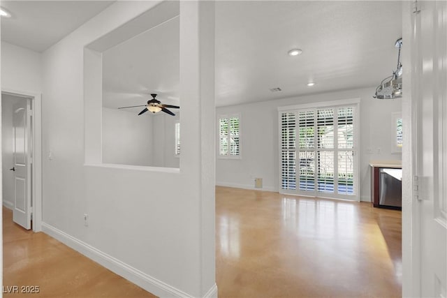 4036 W Bird Man Ln, North Las Vegas, NV 89084 - corridor with recessed lighting and finished concrete floors