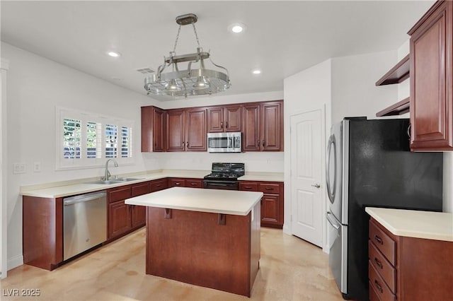 4036 W Bird Man Ln, North Las Vegas, NV 89084 - kitchen with stainless steel appliances, a kitchen island, recessed lighting, and light countertops