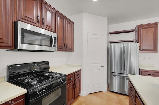 4036 W Bird Man Ln, North Las Vegas, NV 89084 - kitchen featuring appliances with stainless steel finishes and light countertops