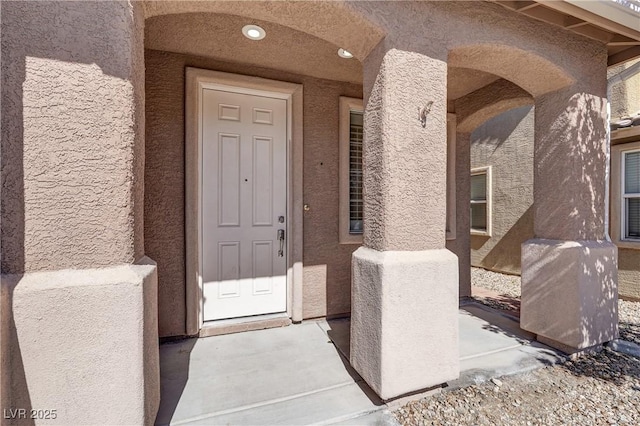 4036 W Bird Man Ln, North Las Vegas, NV 89084 - doorway to property featuring stucco siding