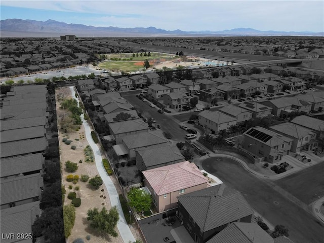 4036 W Bird Man Ln, North Las Vegas, NV 89084 - aerial view of residential area with a mountain backdrop
