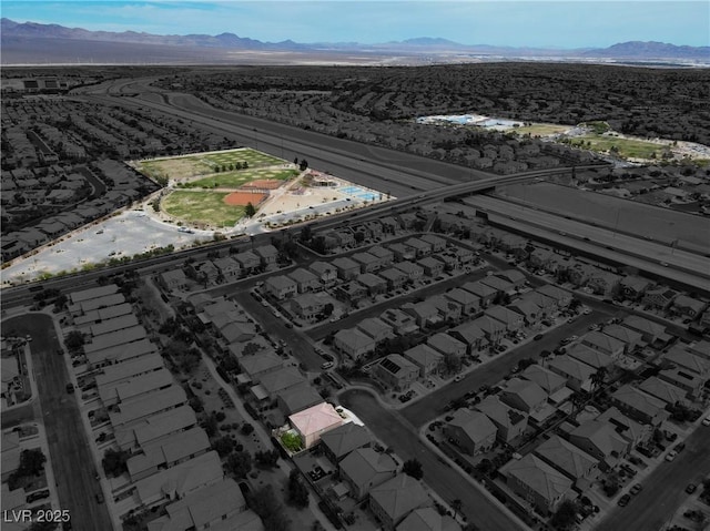 4036 W Bird Man Ln, North Las Vegas, NV 89084 - aerial view of a mountainous background