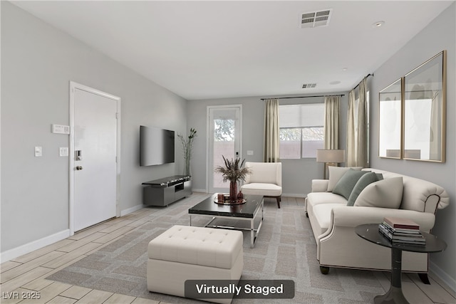 5324 Pendergrass St, North Las Vegas, NV 89081 - living area featuring baseboards and light wood-type flooring