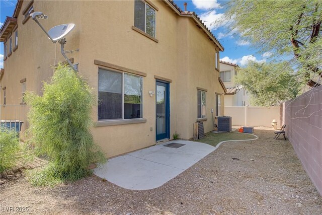 5324 Pendergrass St, North Las Vegas, NV 89081 - back of house with stucco siding, a fenced backyard, a patio, and a tile roof