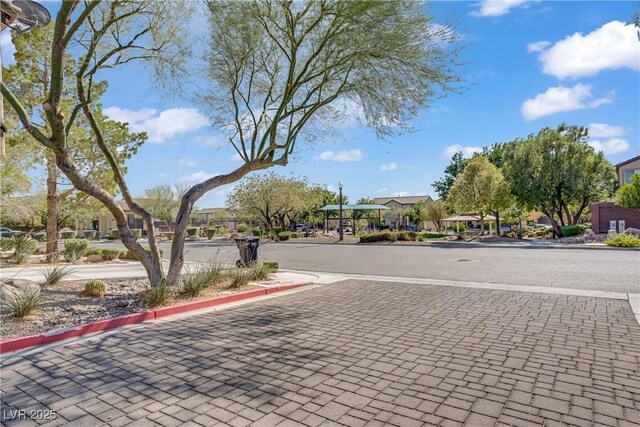 5324 Pendergrass St, North Las Vegas, NV 89081 - view of asphalt road with curbs