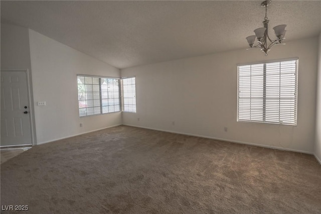 1349 Goldenglow Rd, Las Vegas, NV 89108 - carpeted spare room with a chandelier, vaulted ceiling, and a textured ceiling