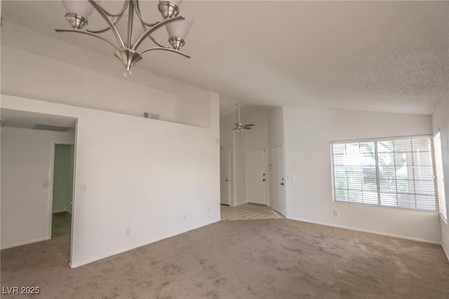 1349 Goldenglow Rd, Las Vegas, NV 89108 - spare room featuring vaulted ceiling, carpet flooring, a chandelier, and ceiling fan