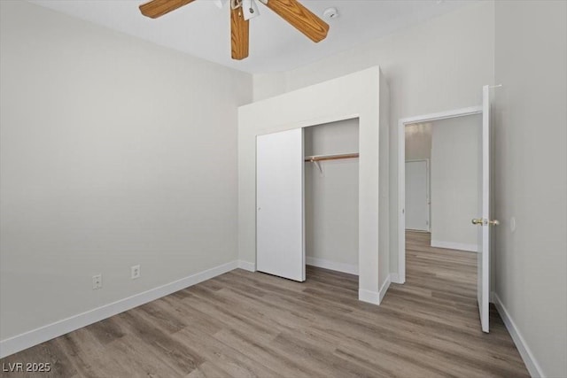 905 Harp Way N, Las Vegas, NV 89032 - unfurnished bedroom with wood finished floors, a closet, and ceiling fan