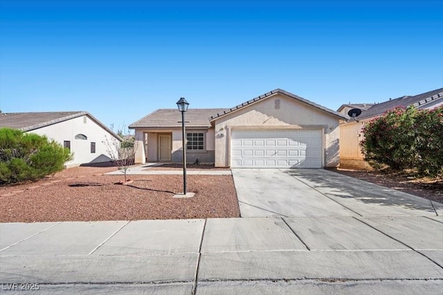 905 Harp Way N, Las Vegas, NV 89032 - ranch-style house with a garage, concrete driveway, stucco siding, and a tiled roof