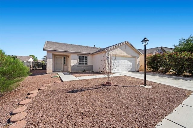 905 Harp Way N, Las Vegas, NV 89032 - single story home featuring concrete driveway, an attached garage, and stucco siding
