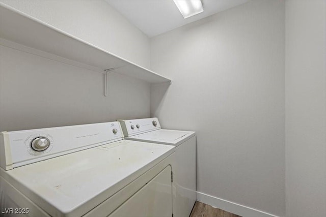905 Harp Way N, Las Vegas, NV 89032 - laundry area featuring washer and clothes dryer and light wood-type flooring