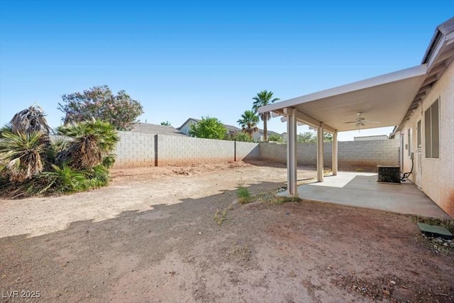 905 Harp Way N, Las Vegas, NV 89032 - fenced backyard featuring a ceiling fan and a patio area
