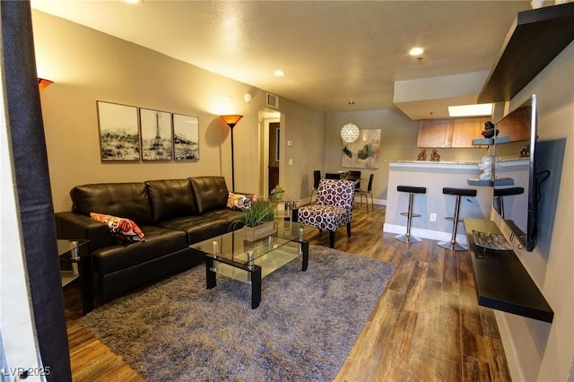 4200 S Valley View Blvd Unit 1035, Las Vegas, NV 89103 - living room with dark wood-style floors, recessed lighting, and bar