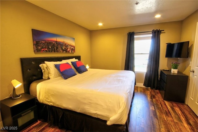 4200 S Valley View Blvd Unit 1035, Las Vegas, NV 89103 - bedroom with dark wood-style floors and recessed lighting