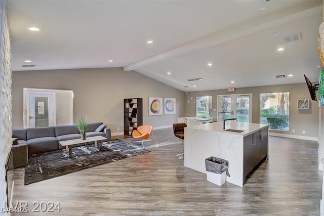 4200 S Valley View Blvd Unit 1035, Las Vegas, NV 89103 - kitchen with wood finished floors, open floor plan, a center island with sink, and recessed lighting