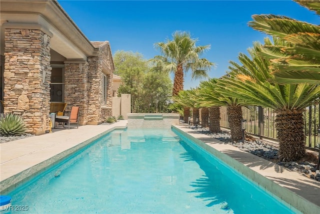 3042 Soft Horizon Way, Las Vegas, NV 89135 - view of swimming pool with a pool with connected hot tub and a patio