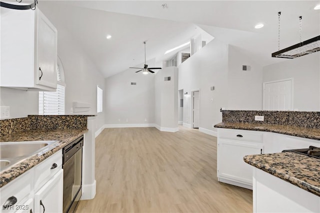 2925 Wigwam Pkwy Unit 1021, Henderson, NV 89074 - kitchen featuring stainless steel dishwasher, ceiling fan, white cabinets, light wood-type flooring, and high vaulted ceiling