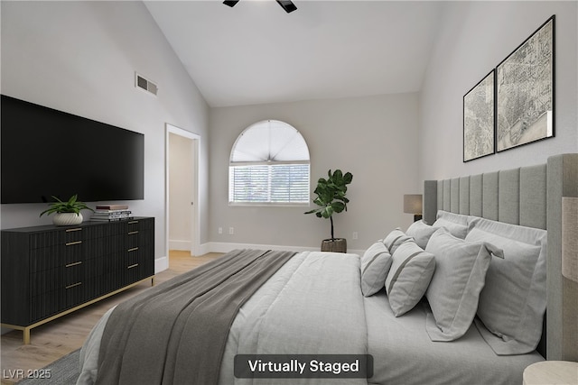 2925 Wigwam Pkwy Unit 1021, Henderson, NV 89074 - bedroom featuring light wood finished floors, high vaulted ceiling, and a ceiling fan